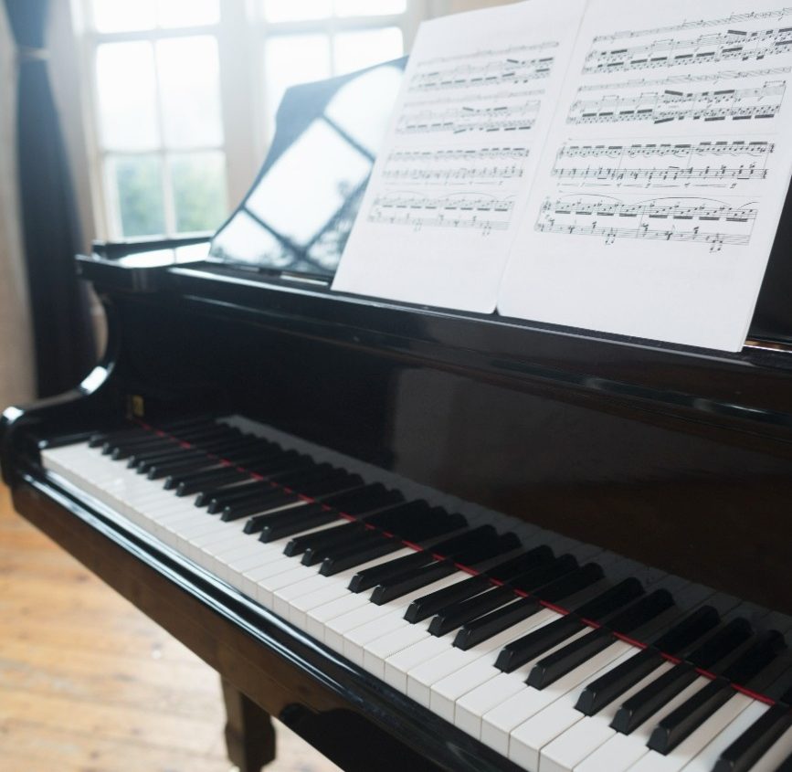 sheet-music-on-a-grand-piano-in-a-rehearsal-studio-2026-01-09-08-44-05-utc (1)